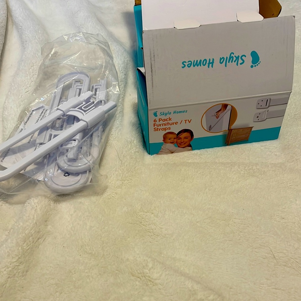 Child safety cabinet locks and furniture straps